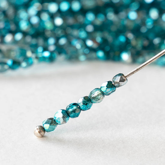 2mm Round Firepolished Beads - Mirror Teal - 50 beads