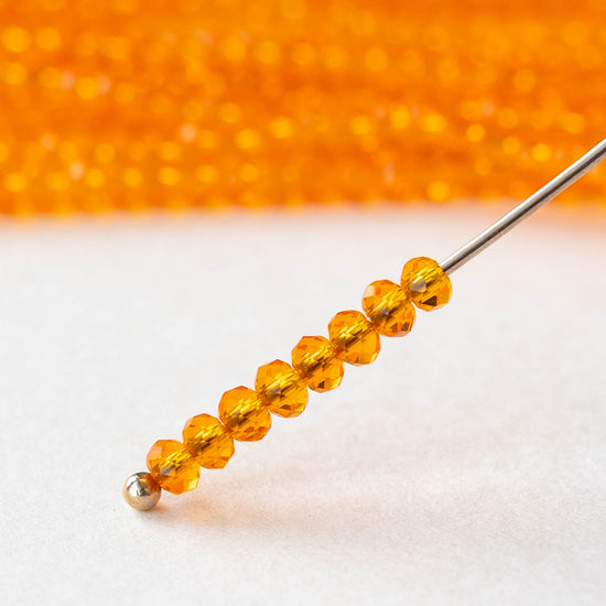 2x3mm Faceted Glass Rondelle Beads - Orange - 16 inches