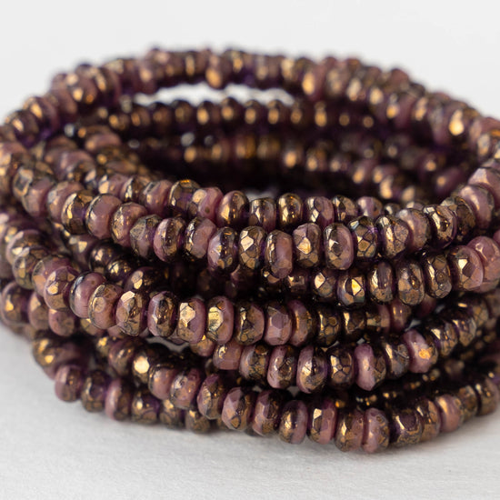 Load image into Gallery viewer, 3x2mm Rondelle Beads - Tanzanite Purple and Pink Opaque Mix with Bronze - 50
