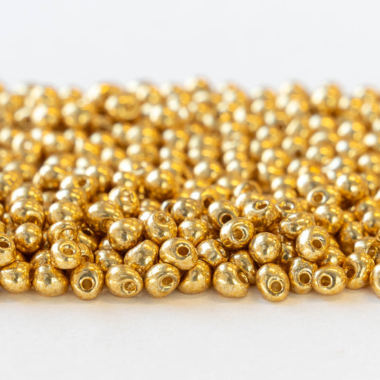 3.4mm Glass Teardrop Beads - Galvanized Gold Finish - 10 grams