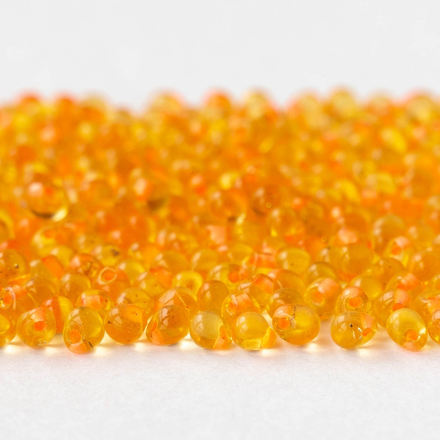 3.4mm Glass Magatama Teardrop Beads - Light Orange - 20 grams