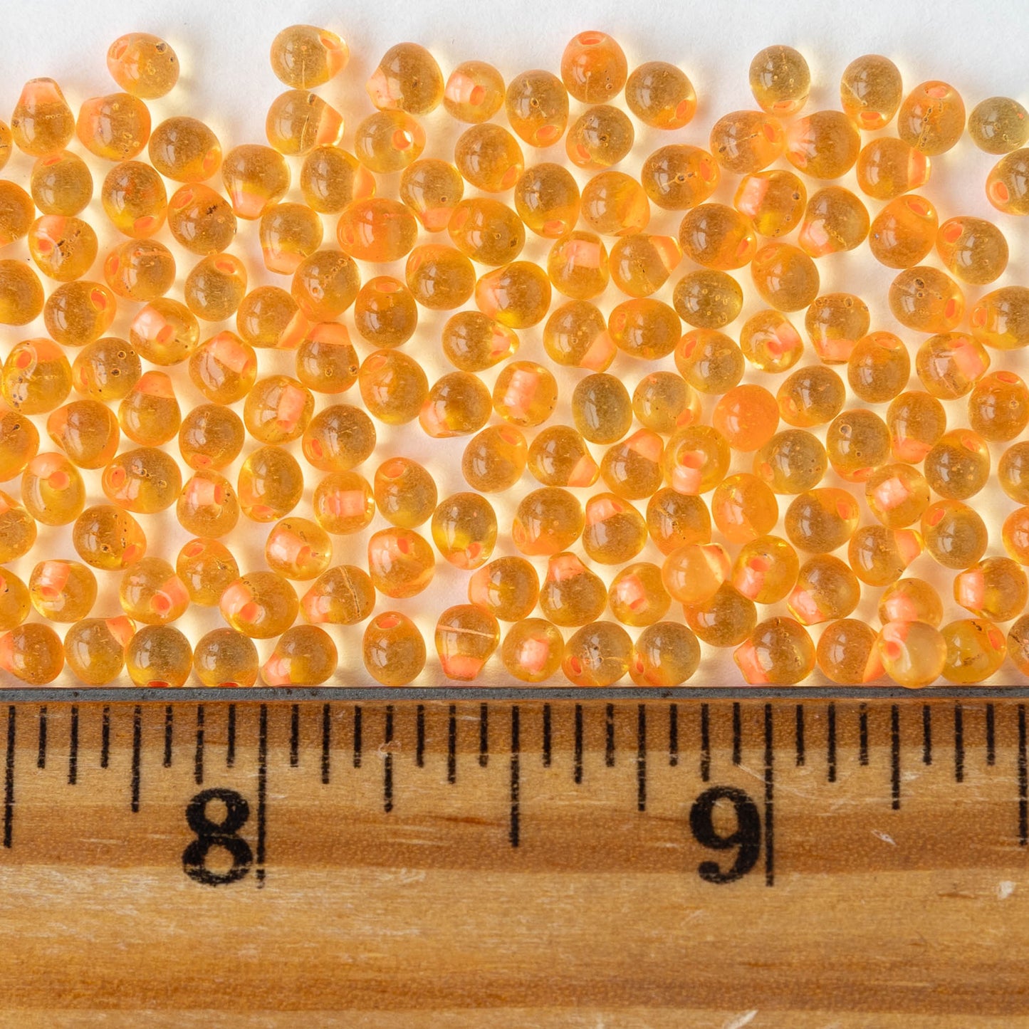 3.4mm Glass Magatama Teardrop Beads - Light Orange - 20 grams