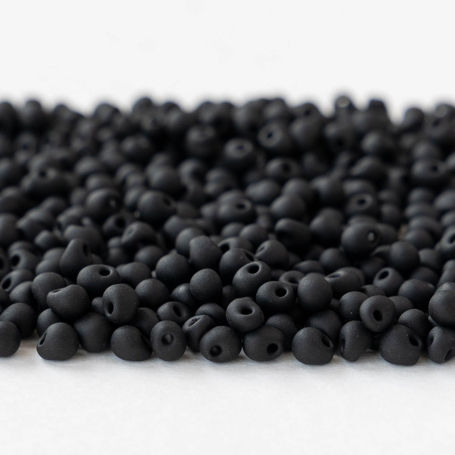 3.4mm Glass Magatama Teardrop Beads - Matte Black - 20 grams