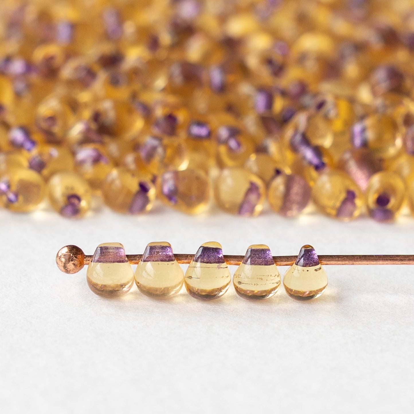 3.4mm Glass Magatama Teardrop Beads - Purple Lined Amber - 10 or 20 grams