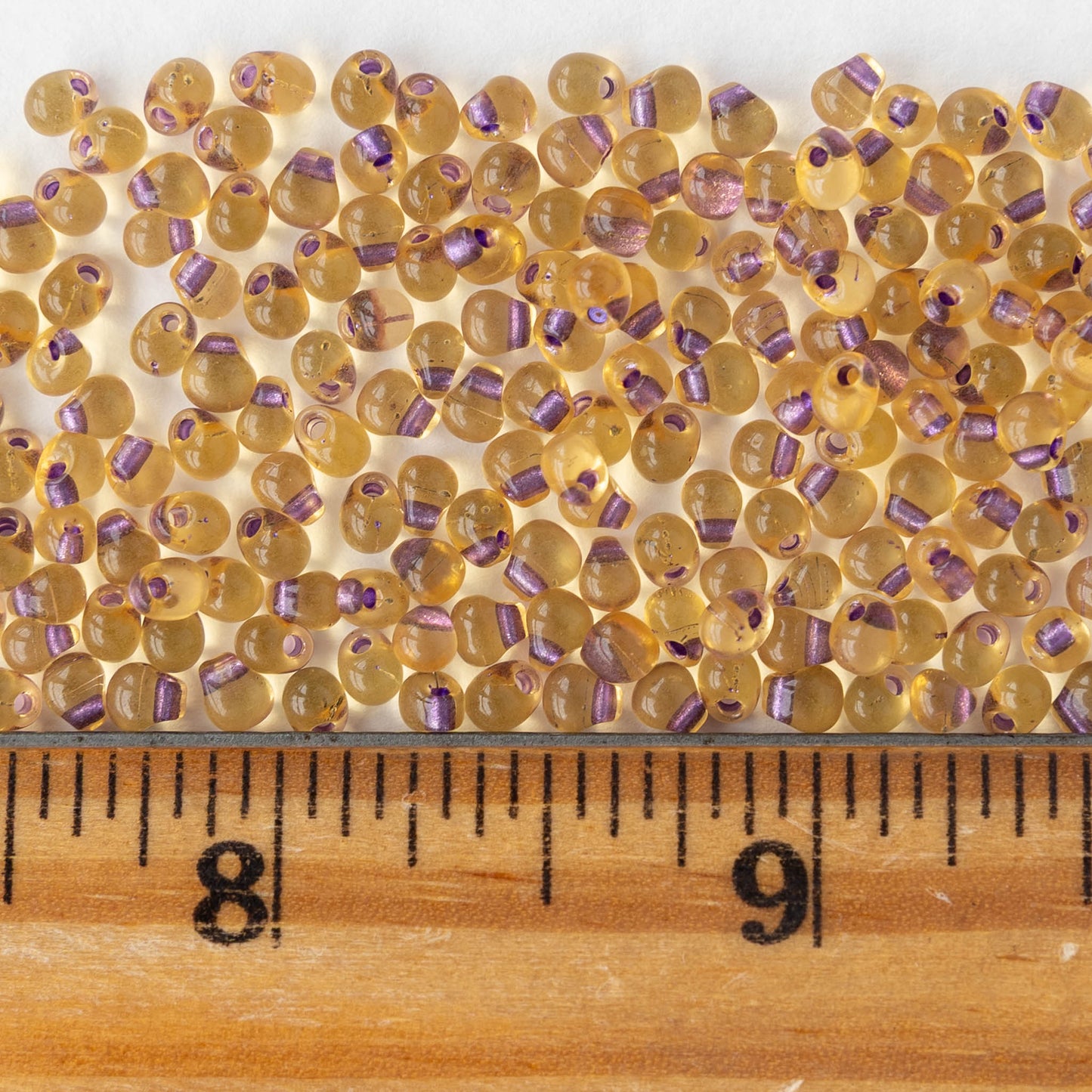 3.4mm Glass Magatama Teardrop Beads - Purple Lined Amber - 10 or 20 grams