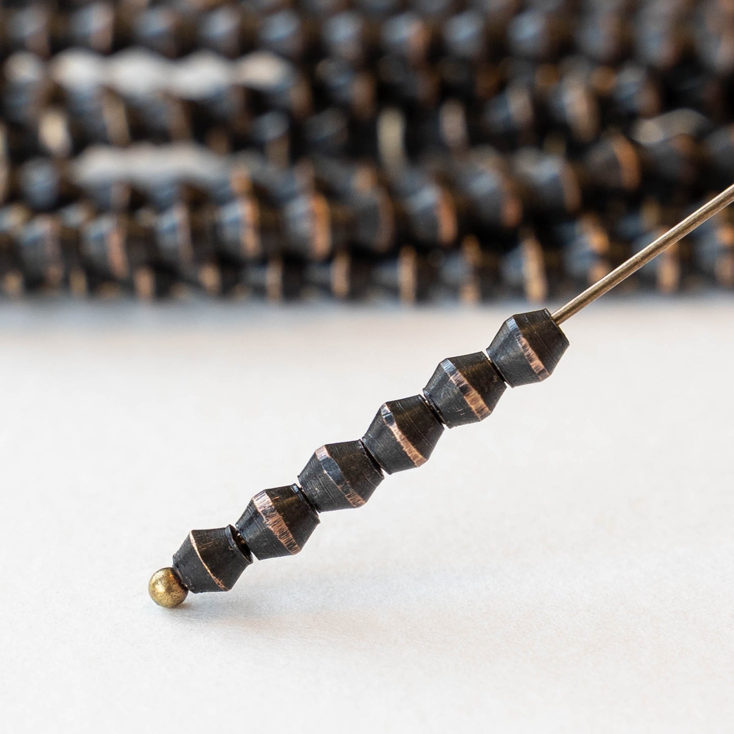 3.5mm Brass Bicone Beads - Black - 6 inch strand ~42 beads