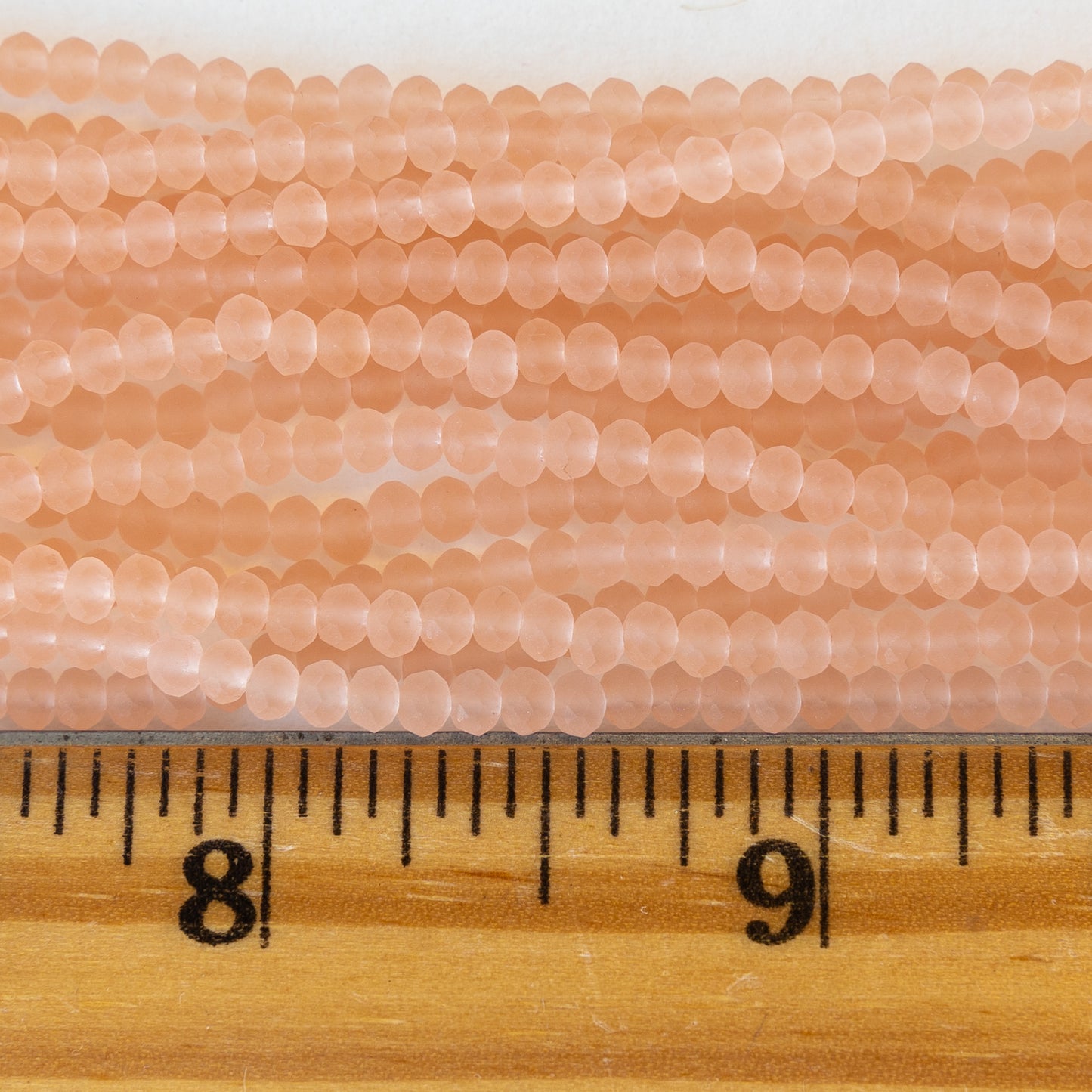 3x2mm Faceted Glass Rondelle Beads - Frosted Peach - 16 Inches