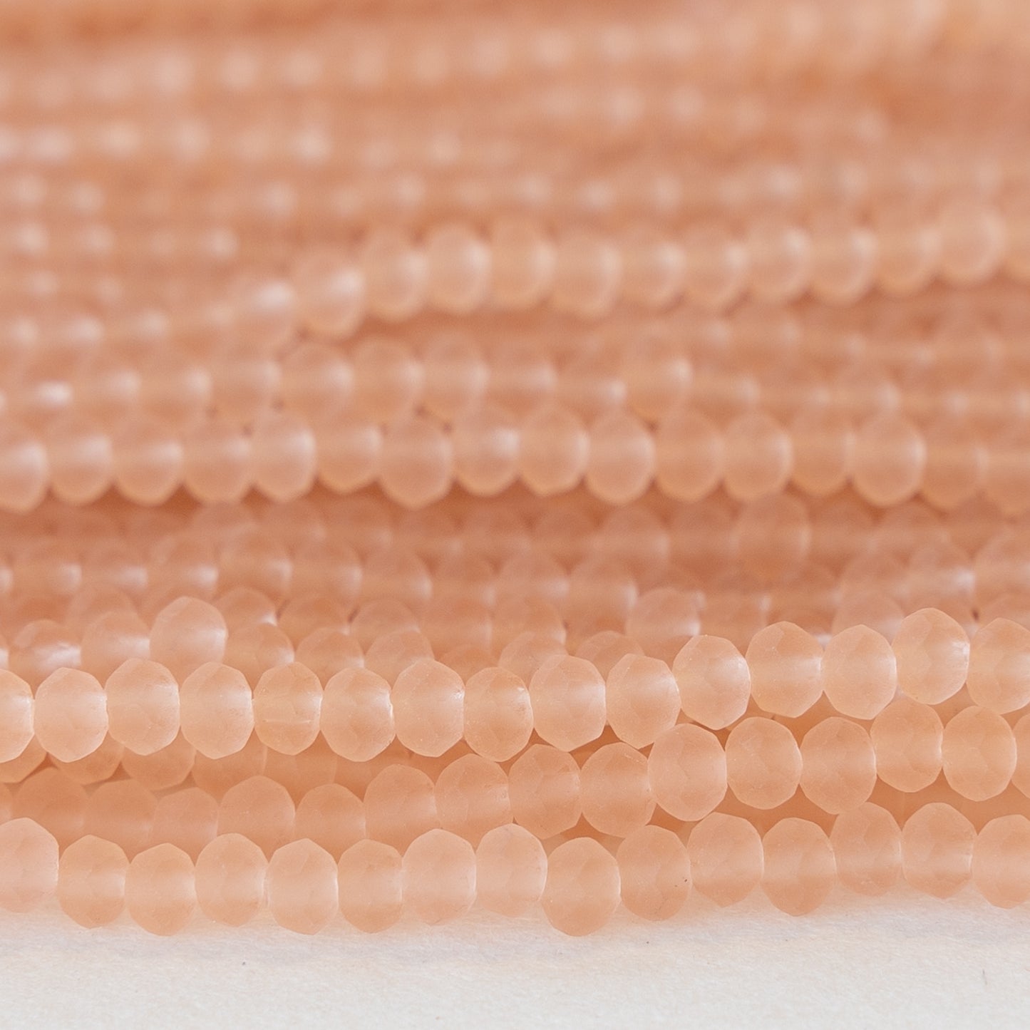 3x2mm Faceted Glass Rondelle Beads - Frosted Peach - 16 Inches