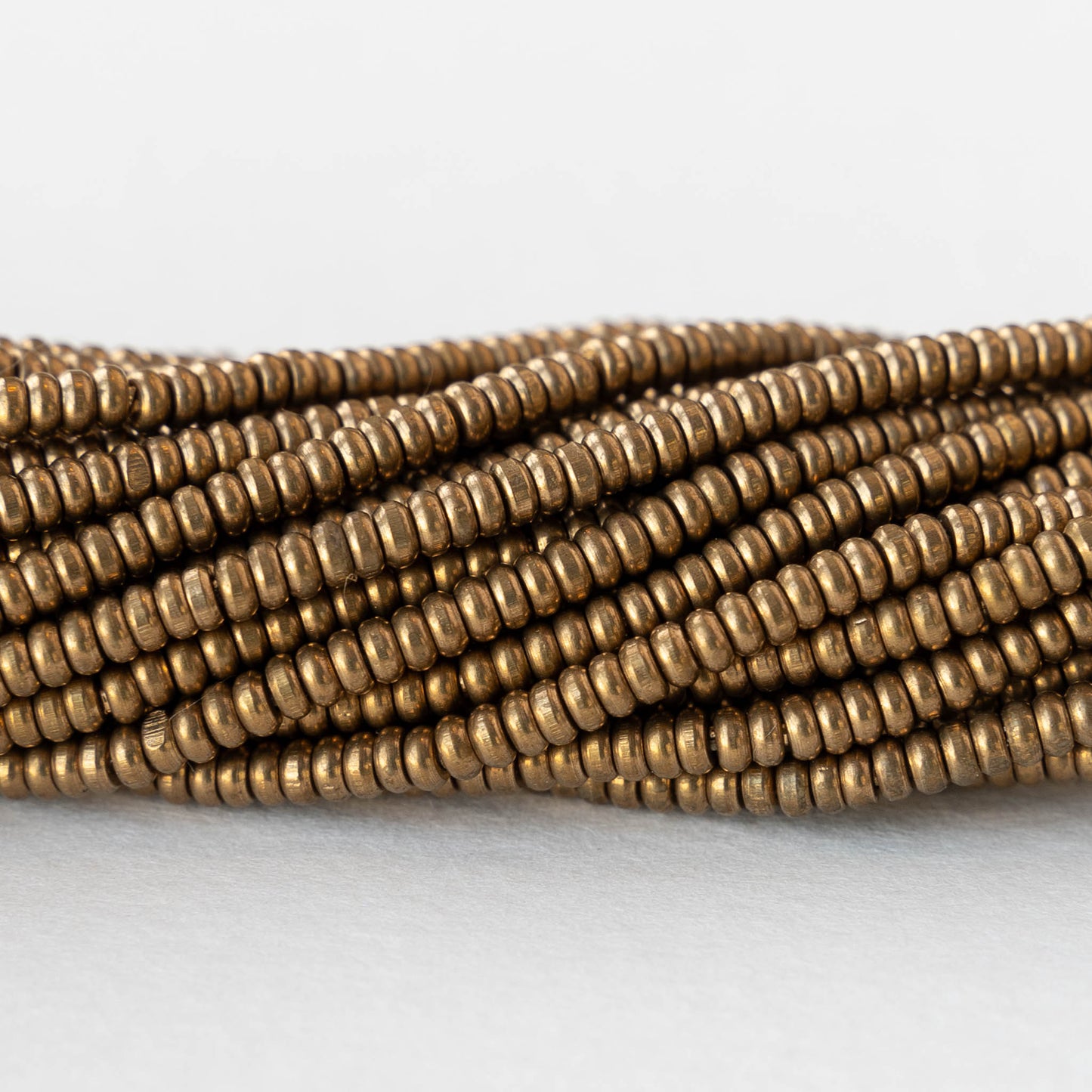 3mm Metal Rondelle Beads - Brass - 6 inches ~120 beads