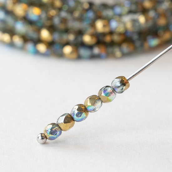 3mm Firepolished Round Beads - Blue Green with Gold Luster AB - 50 Beads