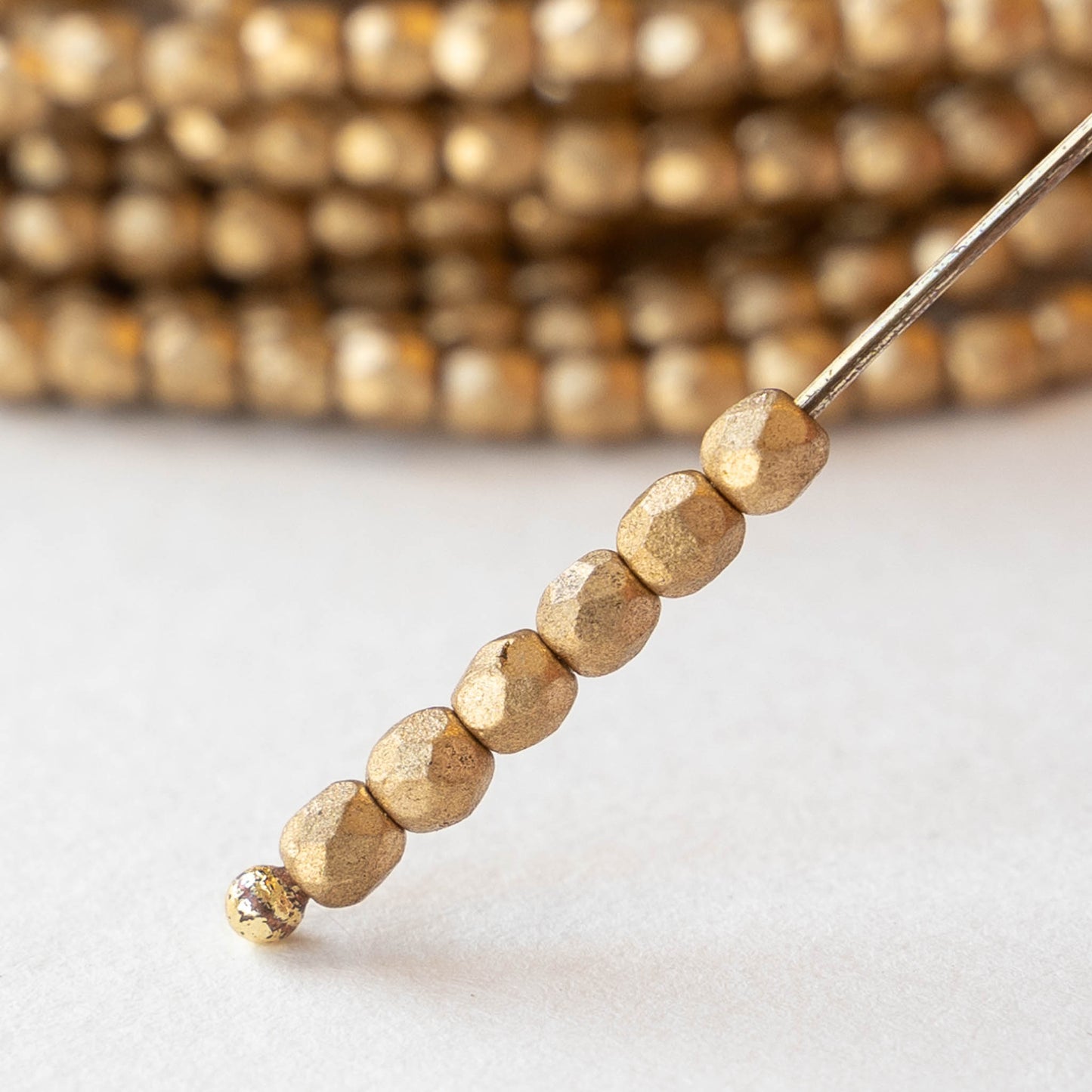 3mm Round Faceted Glass Beads - Matte Gold - 50 Beads