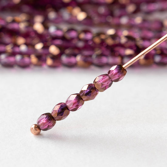 3mm Round Faceted Glass Beads - Transparent Raspberry Bronze - 50 Beads