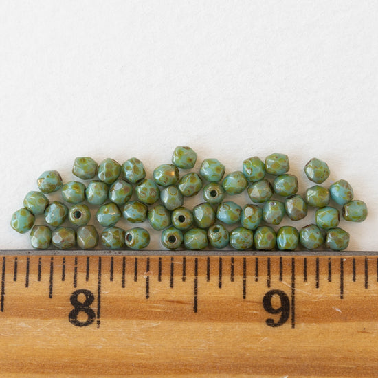 3mm Round Faceted Glass Beads - Opaque Turquoise Picasso - 50 Beads