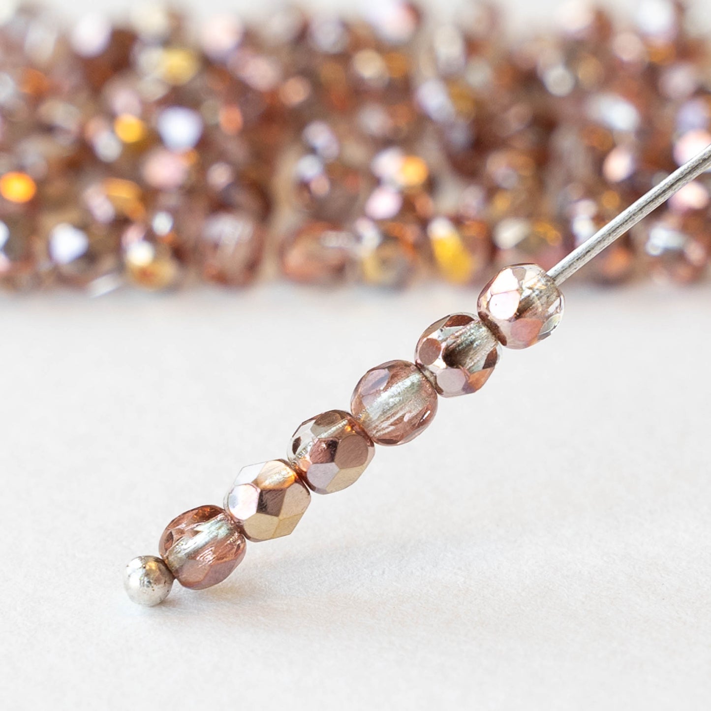 3mm Round Faceted Glass Beads - Transparent Peach with a Metallic Finish - 100 Beads