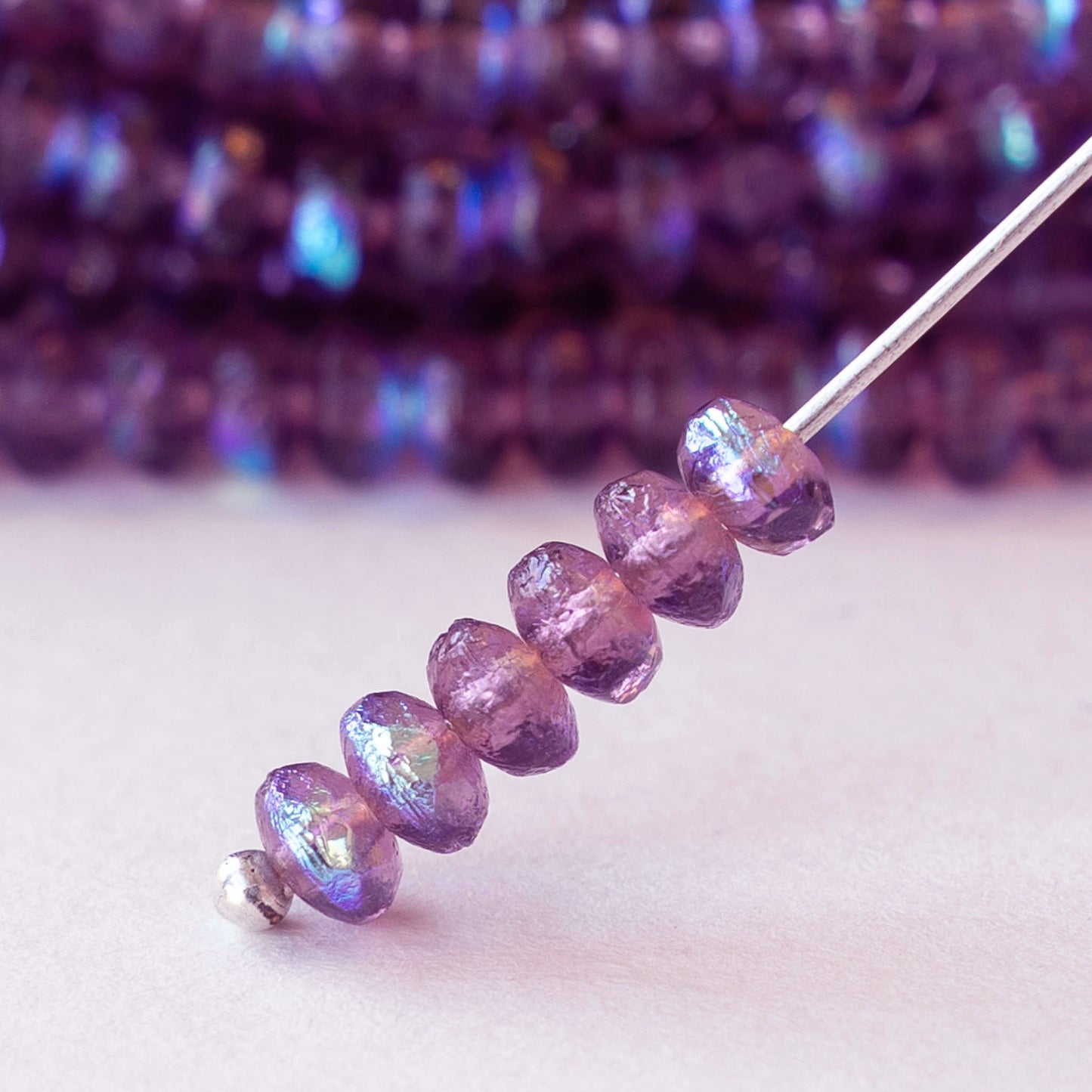 4mm Faceted Glass Rondelle Beads - Transparent Amethyst AB - 50 beads