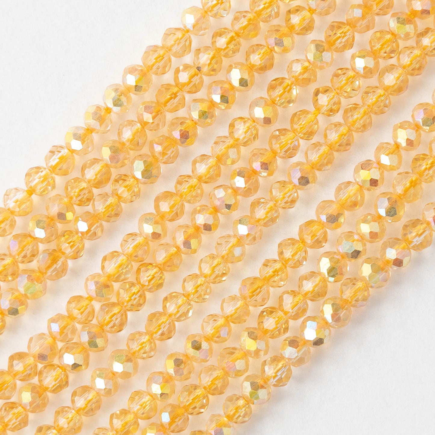3x4mm Faceted Rondelle Beads - Light Orange AB - 13 inch strand ~110 beads