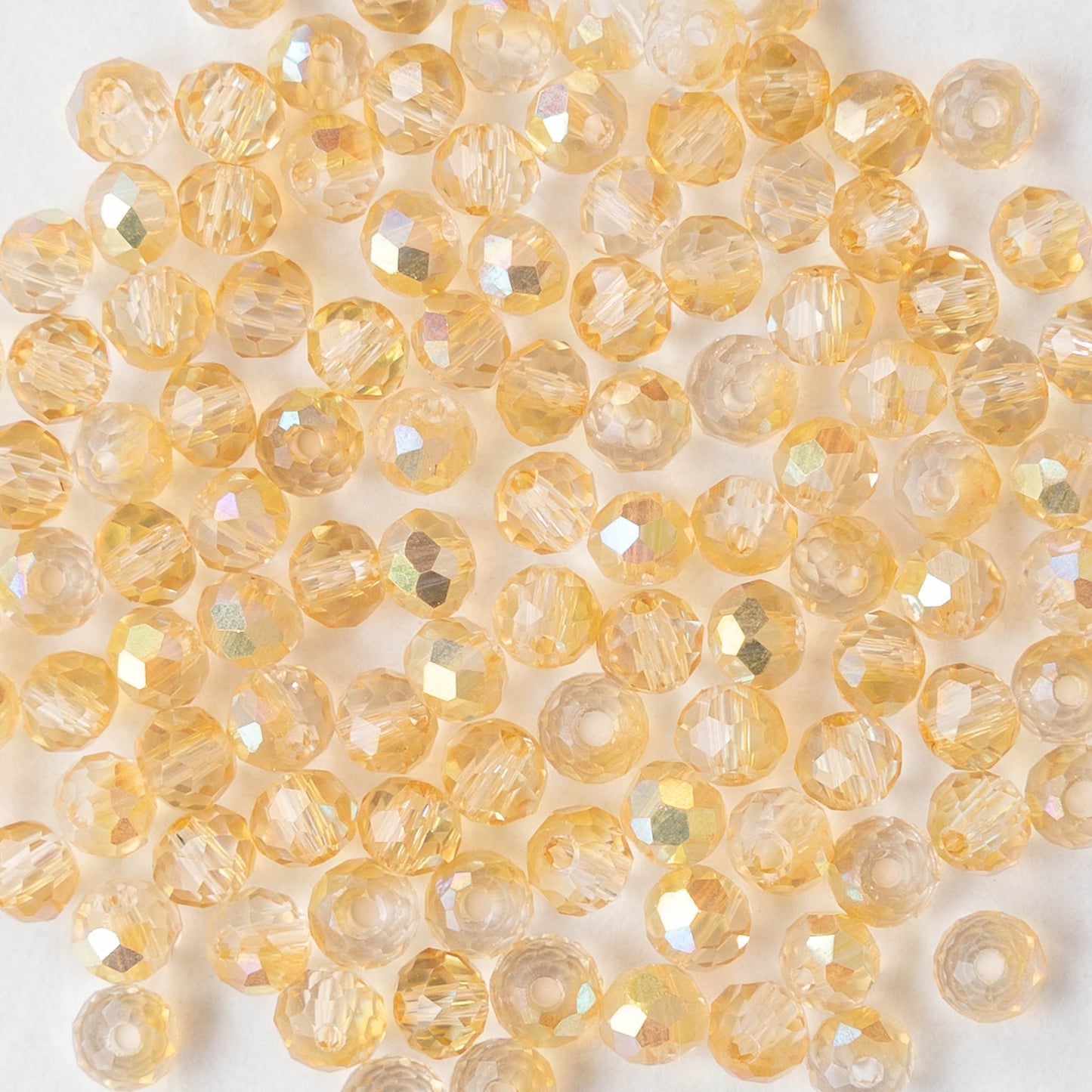 3x4mm Faceted Rondelle Beads - Light Orange AB - 13 inch strand ~110 beads