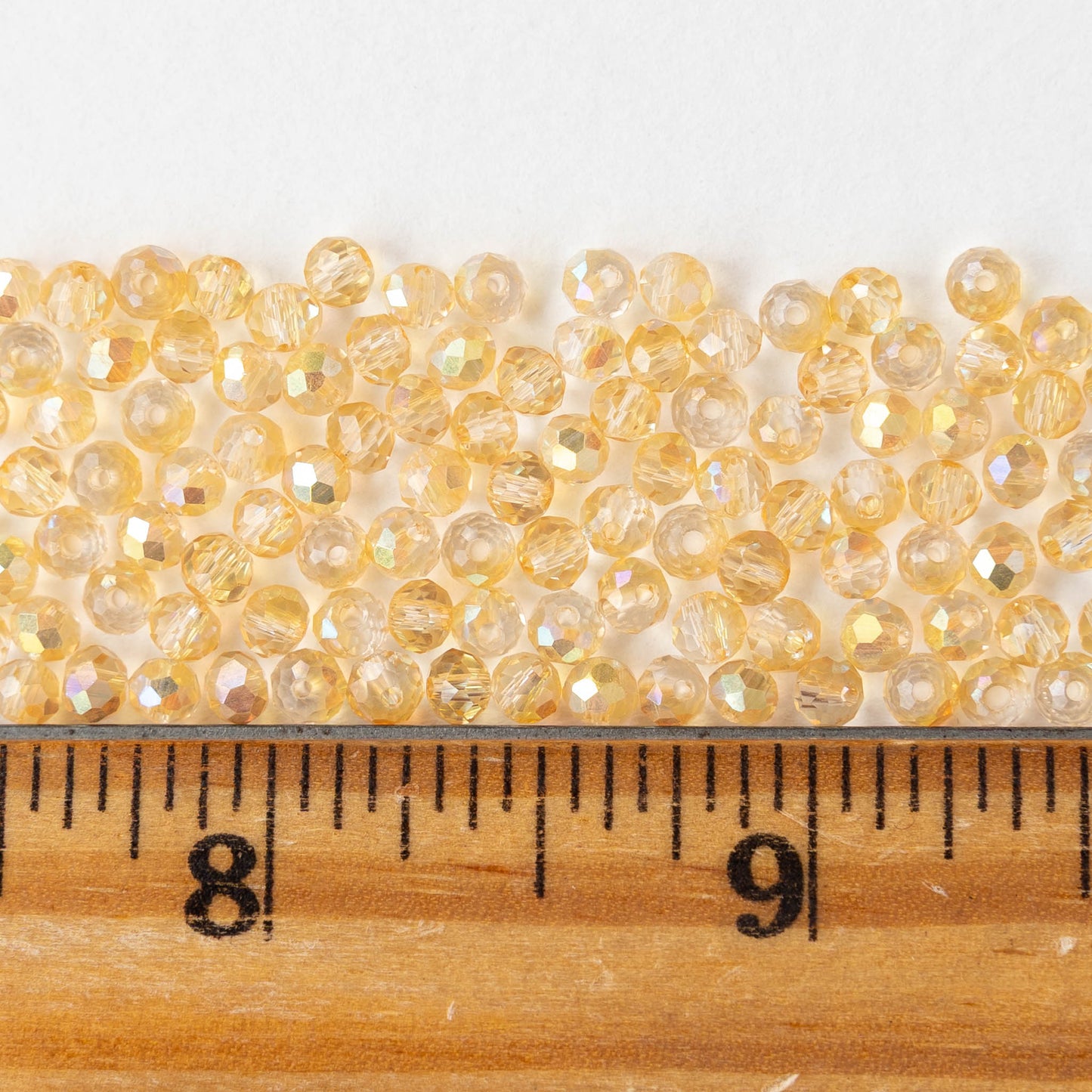 3x4mm Faceted Rondelle Beads - Light Orange AB - 13 inch strand ~110 beads