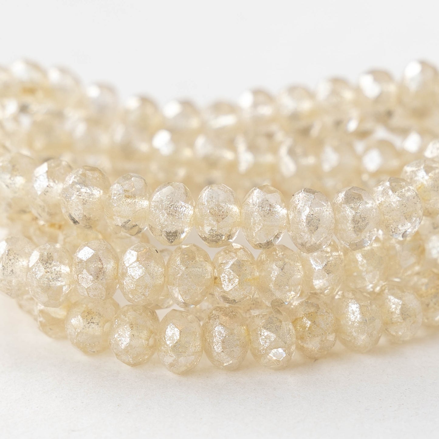 3x5mm Faceted Glass Rondelle Beads - Transparent Champagne with Silver Dust - 30 Beads