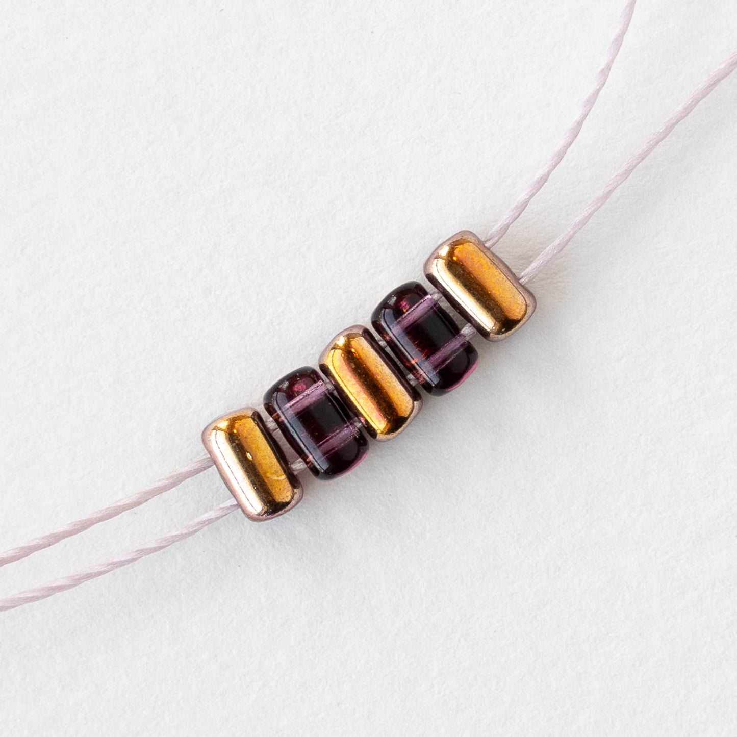 3x5mm Glass Two Hole Rulla Beads - Amethyst Apollo Gold - 10 grams