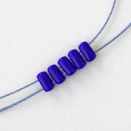 3x5mm Glass Rulla Beads - Opaque Cobalt Blue - 10 grams