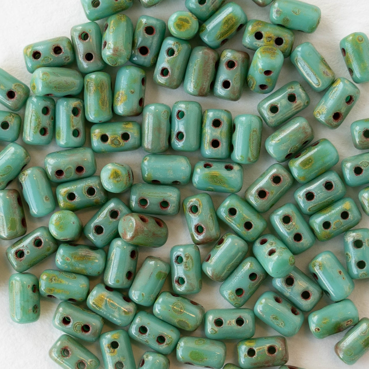 3x5mm Two Hole Rulla Beads - Opaque Turquoise Picasso - 10 grams