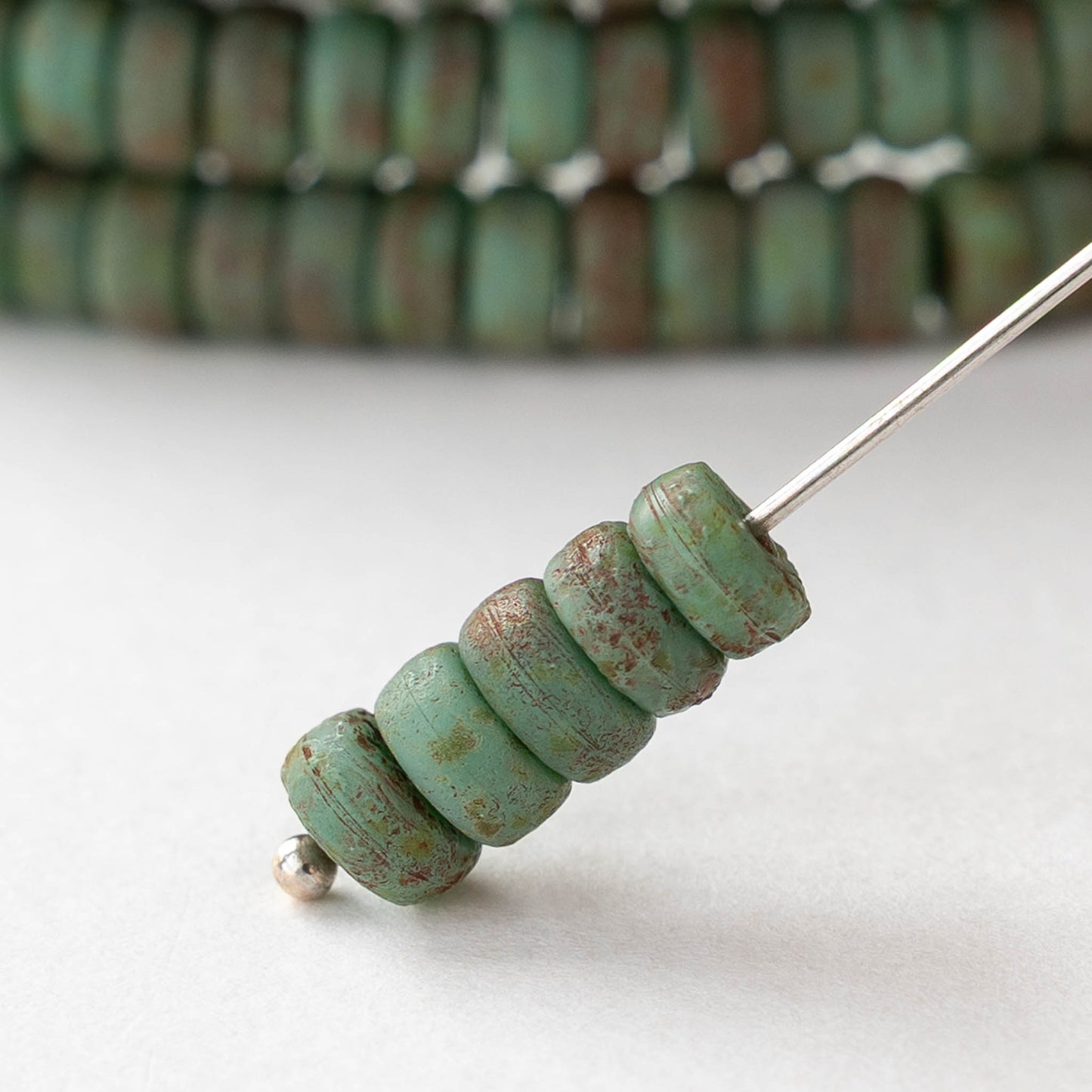 3x6mm Glass Heishi Beads - Etched Turquoise with Red Wash - 25 beads