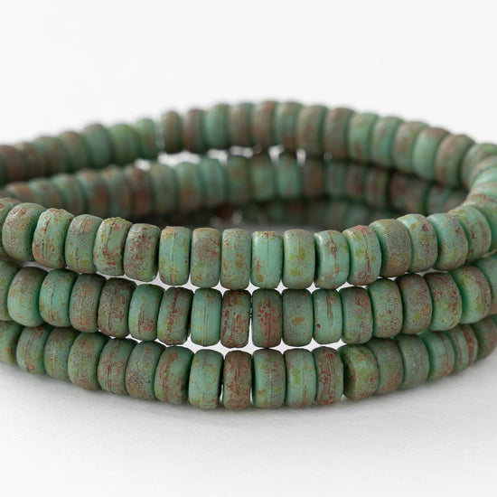 3x6mm Glass Heishi Beads - Etched Turquoise with Red Wash - 25 beads