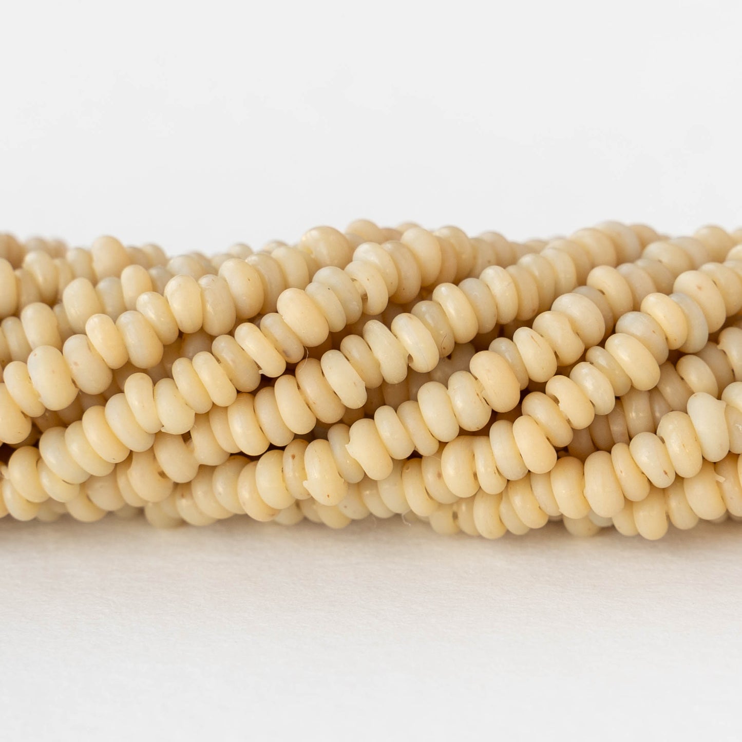 Rustic Indonesian Glass Abon Beads - Opaque Ivory - Whole or Half Strand