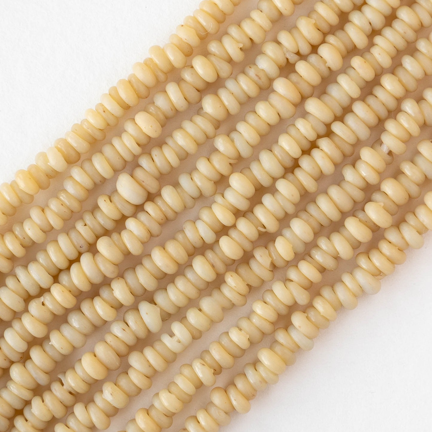Rustic Indonesian Glass Abon Beads - Opaque Ivory - Whole or Half Strand