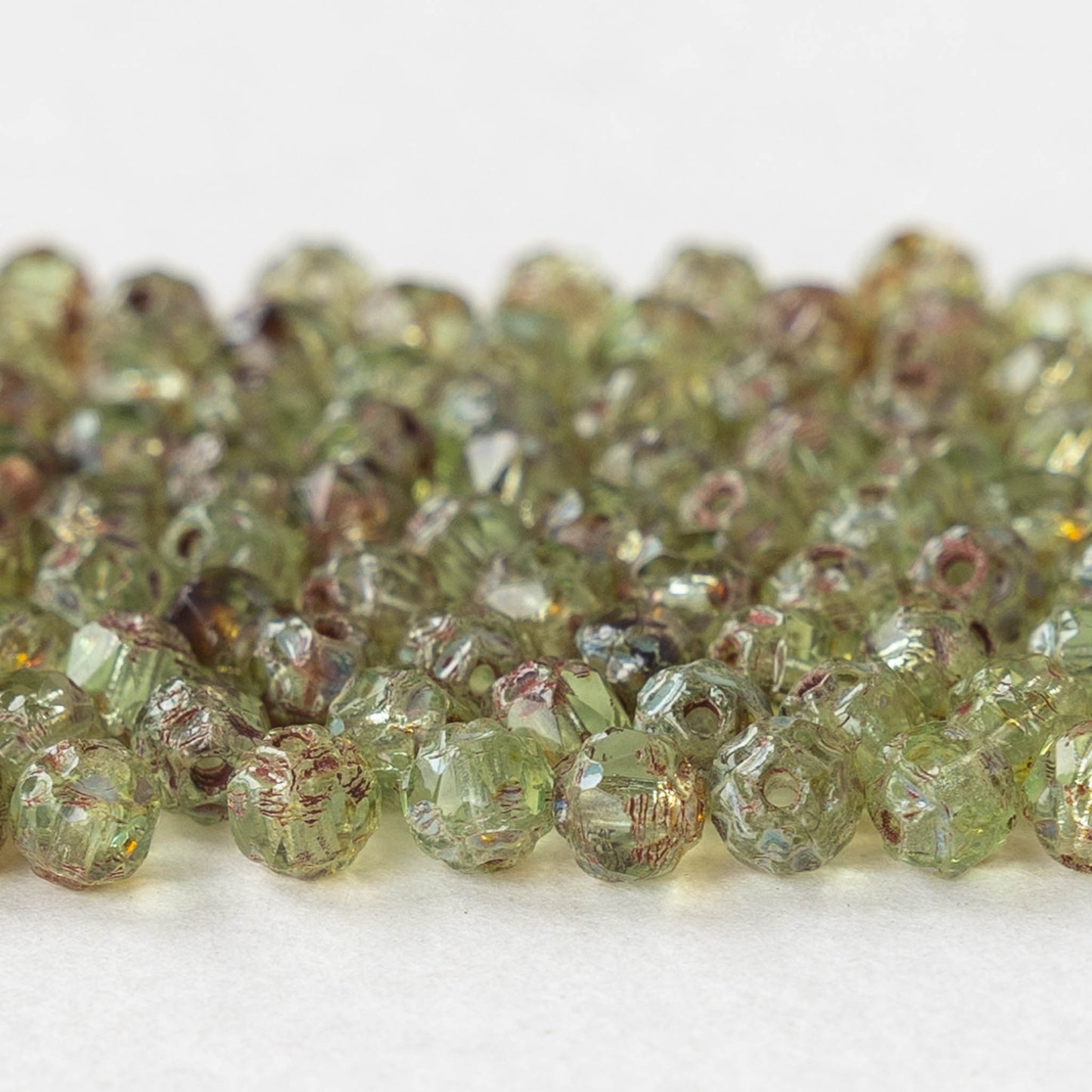4mm Tiny Catherdal Cut Beads - Peridot Green Picasso - 120 beads