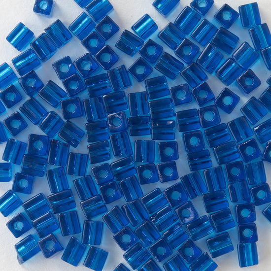 4mm Miyuki Cube Beads  - Transparent Capri Blue - 20 grams