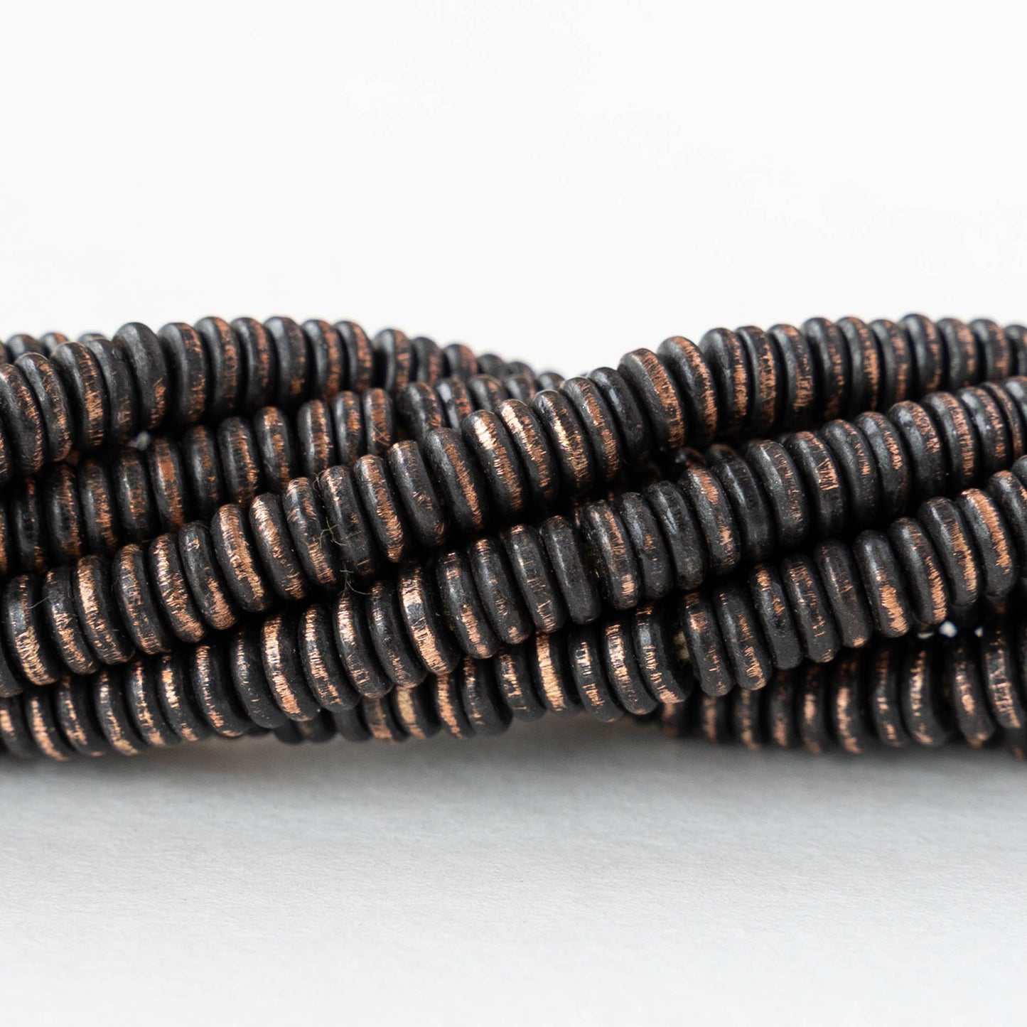 4mm Metal Disk Beads - Black Brass - 4 inch strand ~75 beads