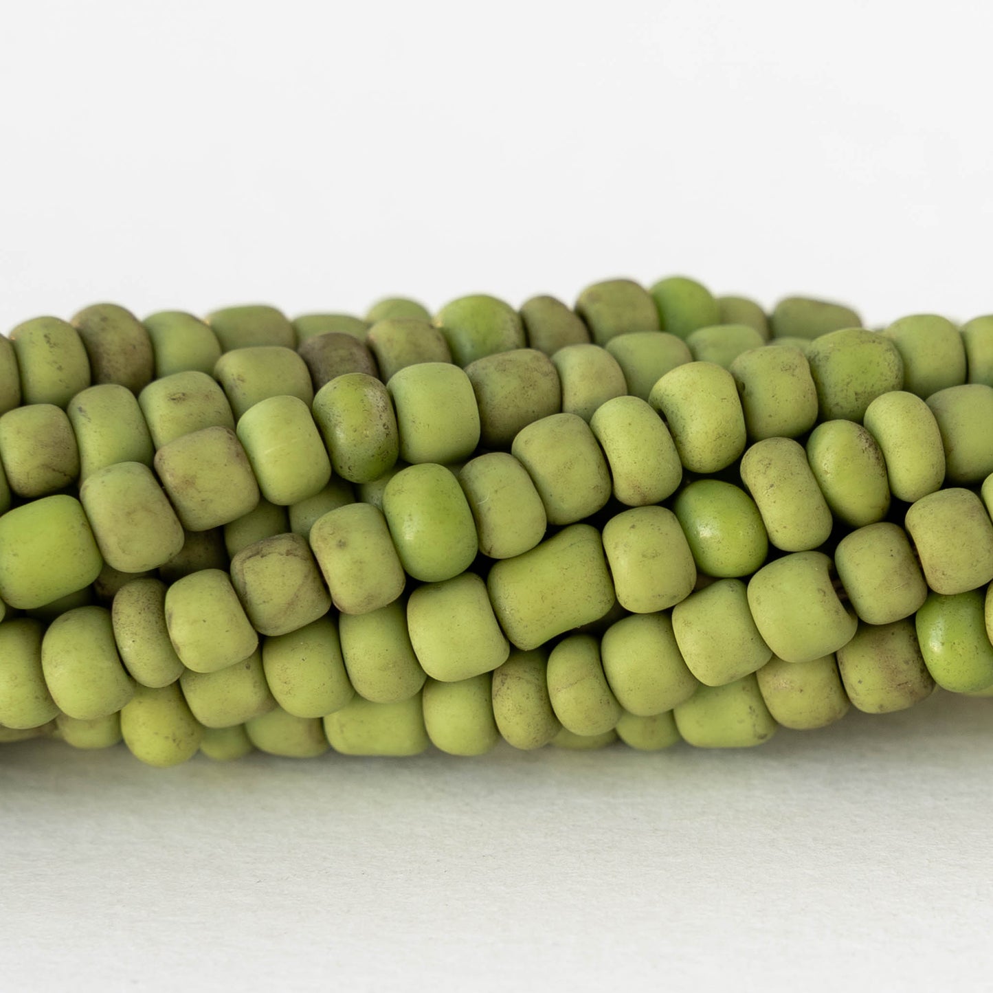 4mm Rustic Indonesian Glass Seed Beads - Opaque Light Green Green - Whole or Half Strand