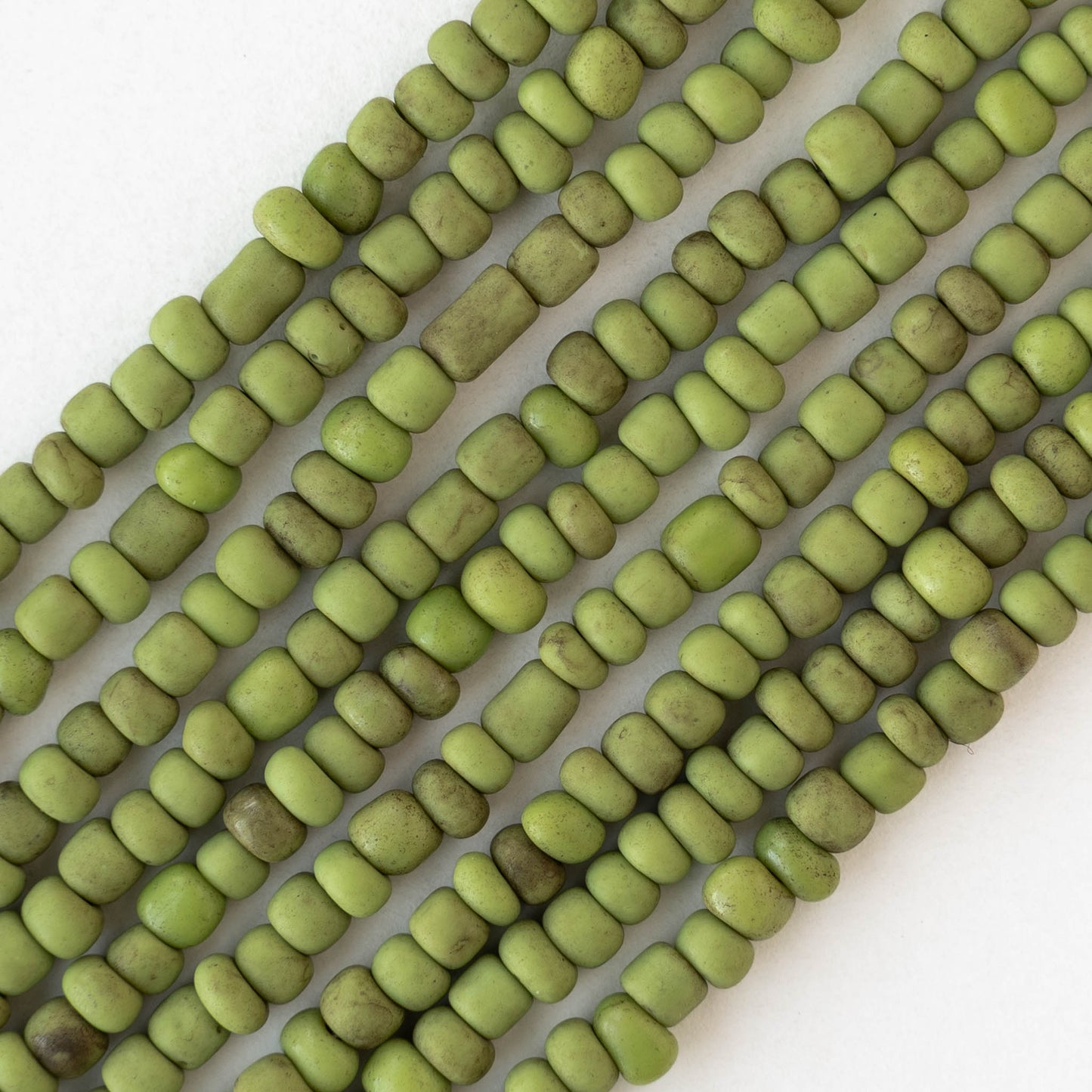 4mm Rustic Indonesian Glass Seed Beads - Opaque Light Green Green - Whole or Half Strand