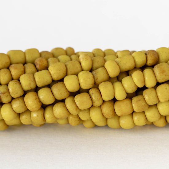 4mm Rustic Indonesian Glass Seed Beads - Opaque Yellow - Whole or Half Strand