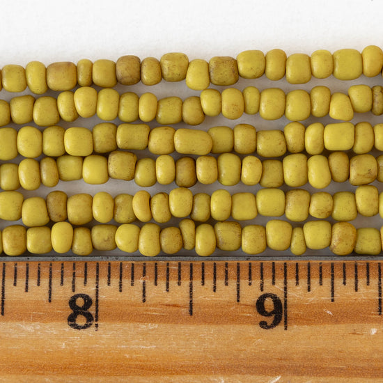 4mm Rustic Indonesian Glass Seed Beads - Opaque Yellow - Whole or Half Strand