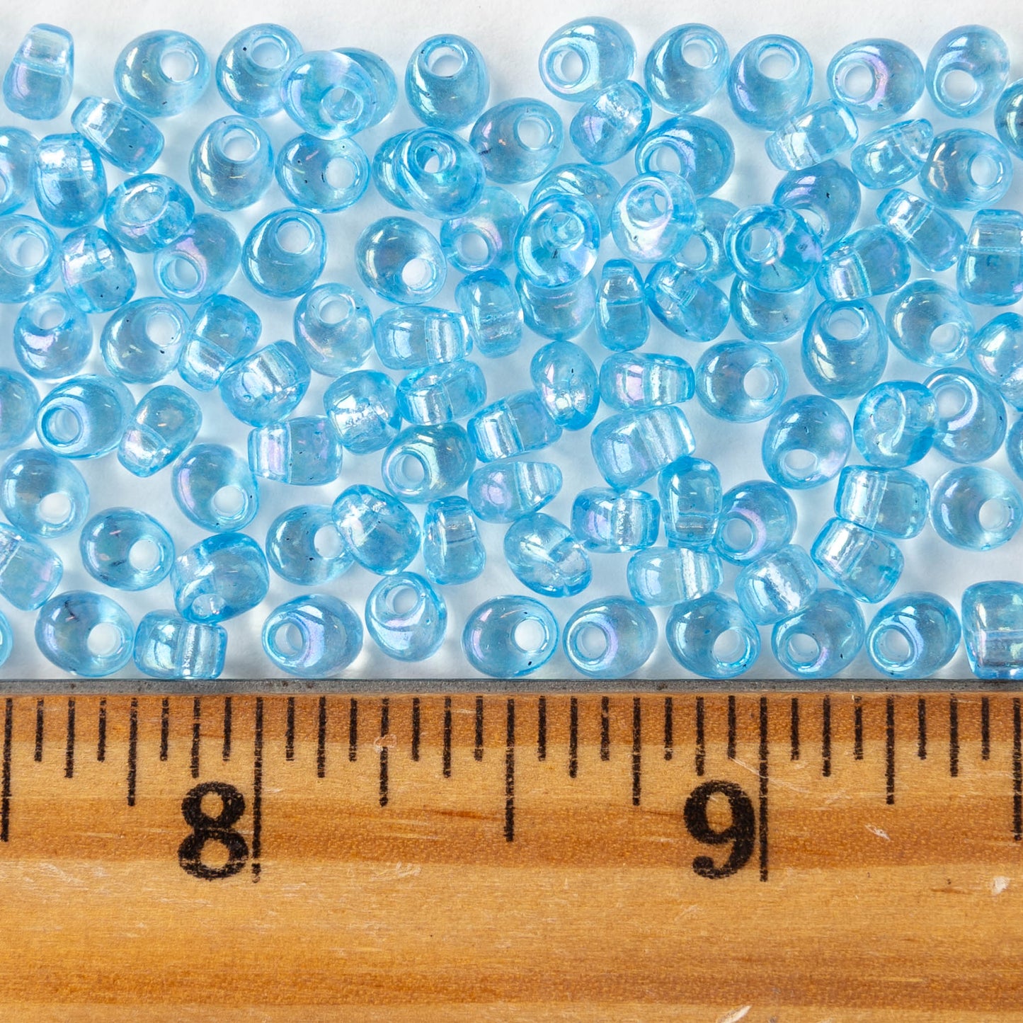 4mm Glass Magatama Teardrops - Transparent Light Blue Aqua AB - 24 grams