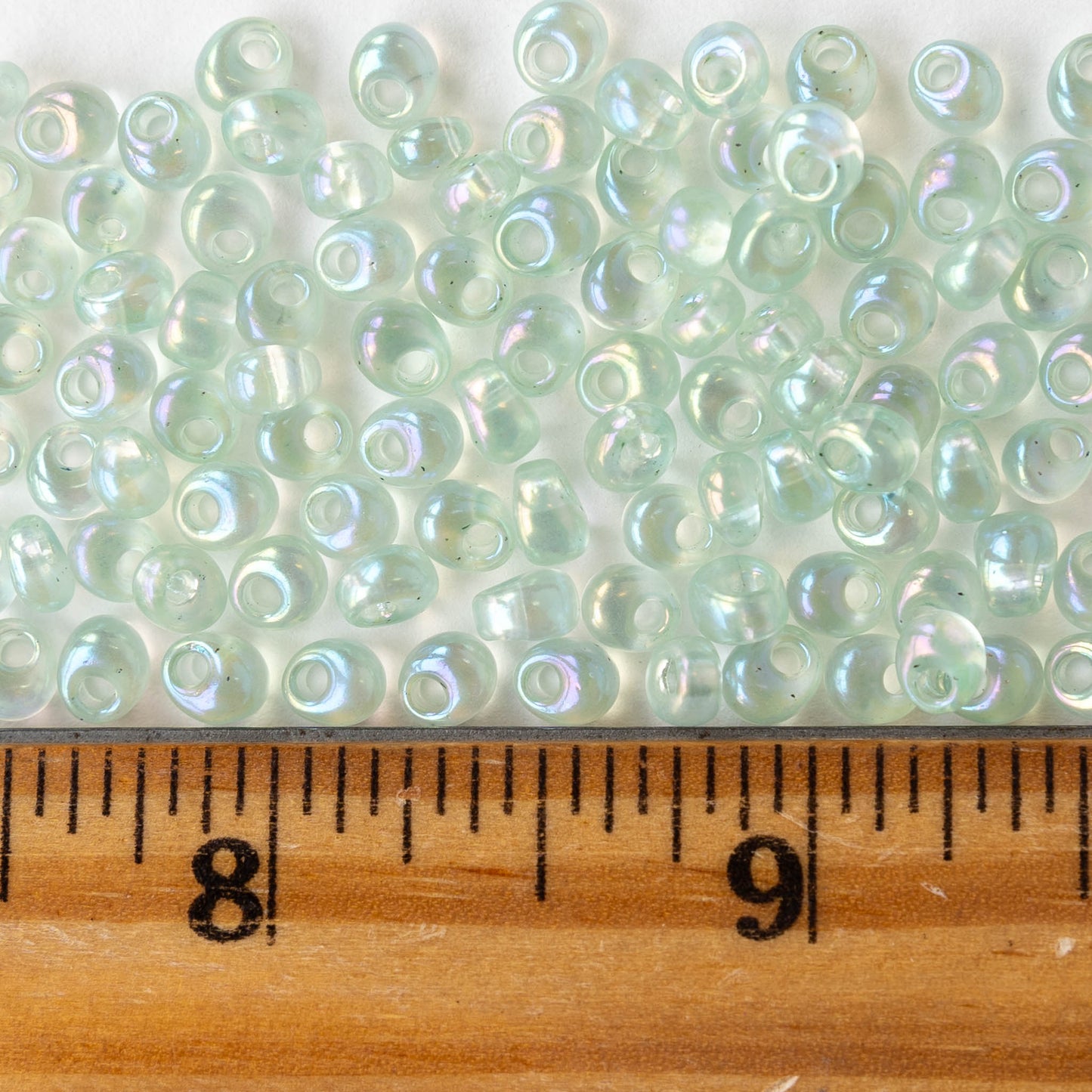 4mm Glass Magatama Teardrops - Transparent Pale Green AB - 24 grams