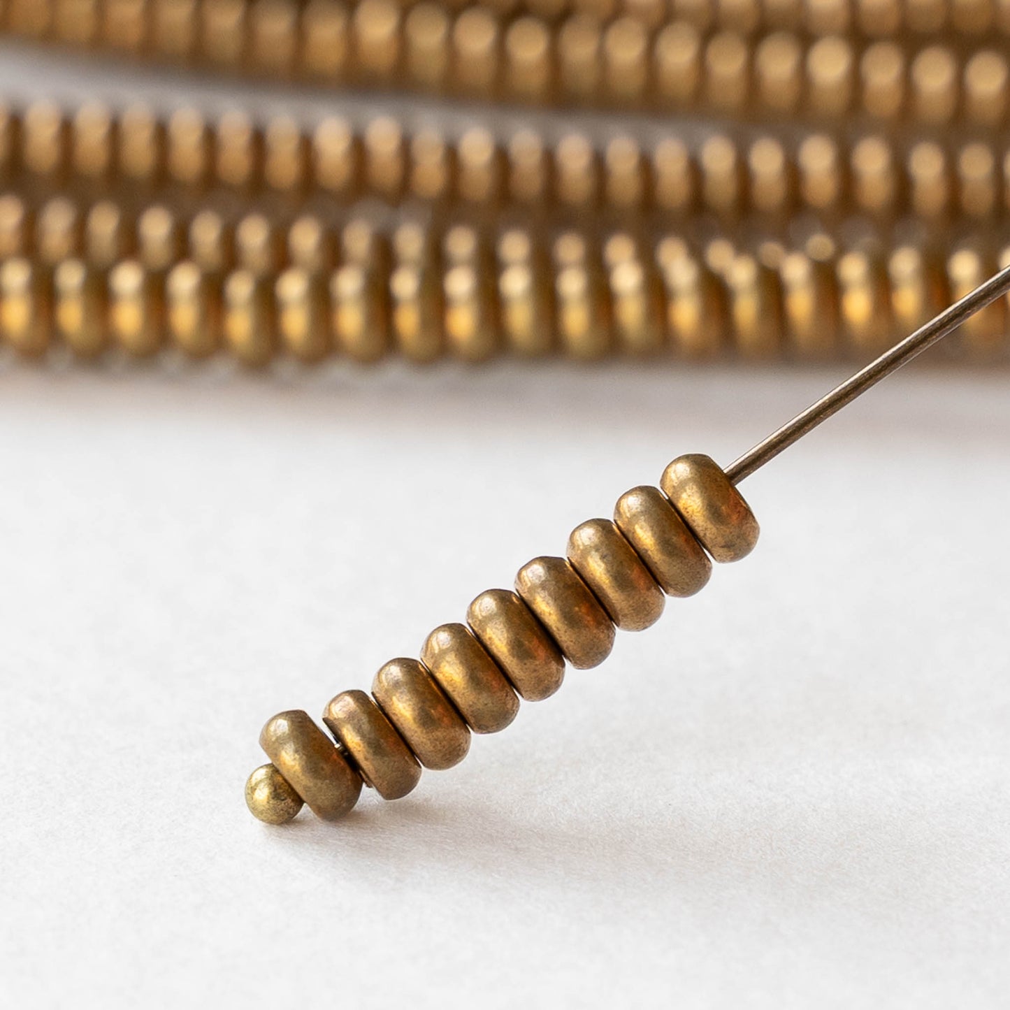 4mm Metal Rondelle Beads - Brass - 4 inches ~35 beads