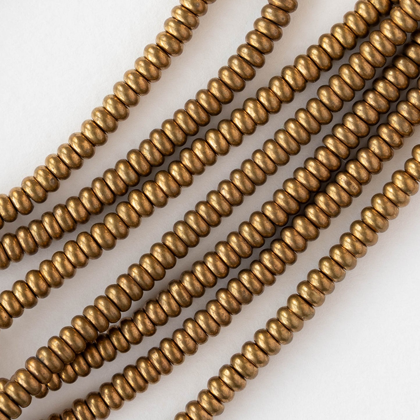 4mm Metal Rondelle Beads - Brass - 4 inches ~35 beads