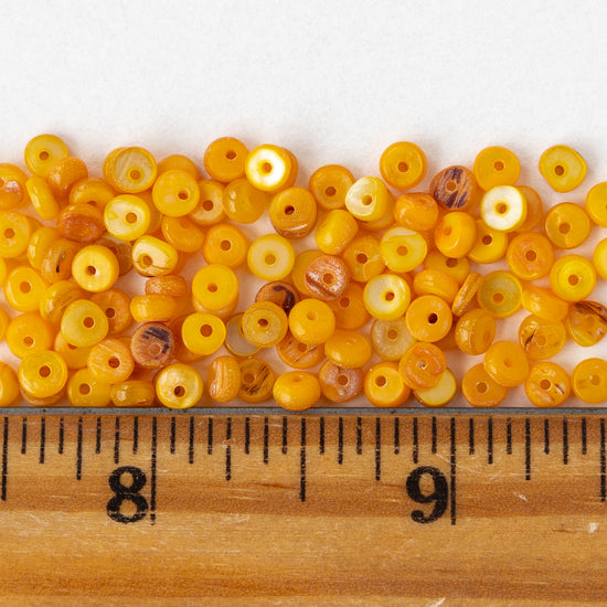 4mm Mother of Pearl Rondelle Beads - Light Orange - 15 inches