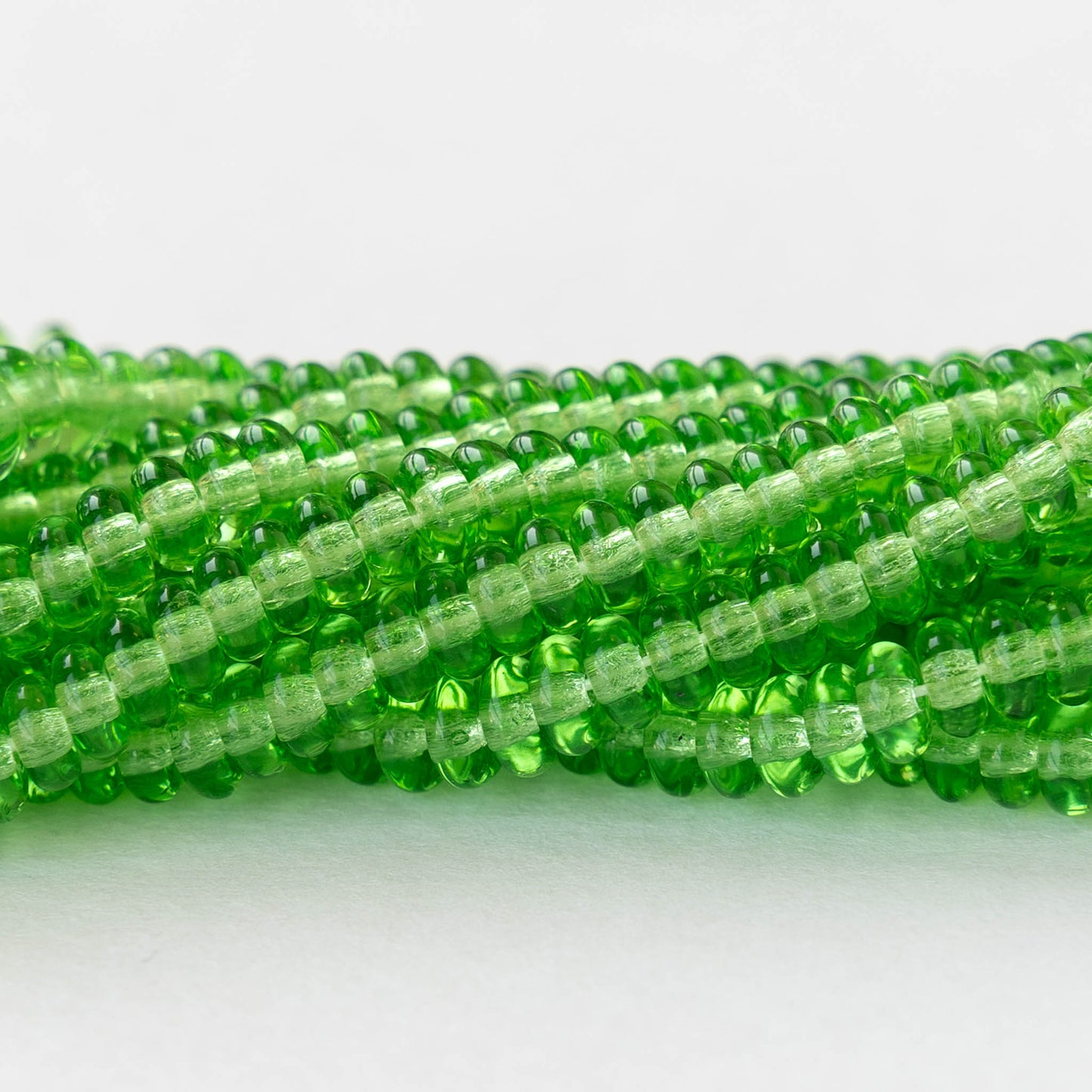 4mm Glass Rondelle Beads - Transparent Peridot Green - 100 beads