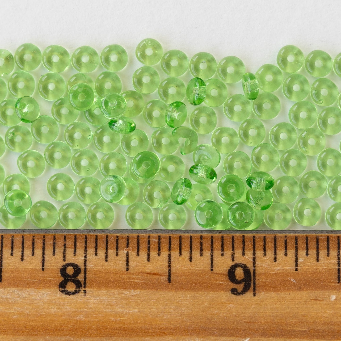 4mm Glass Rondelle Beads - Transparent Peridot Green - 100 beads