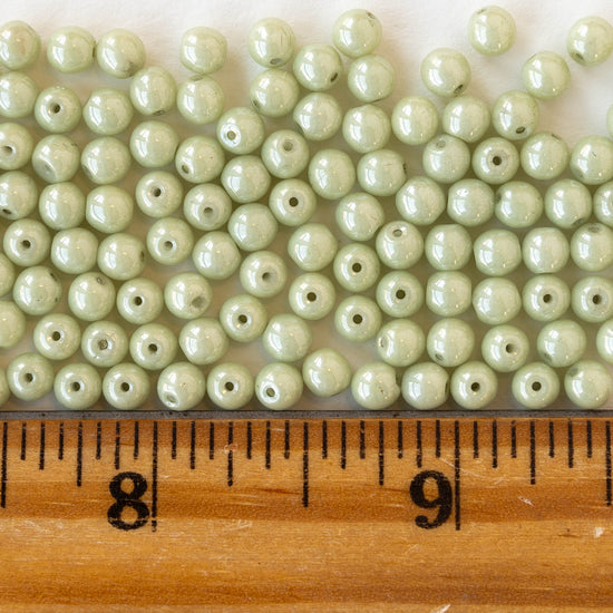 4mm Round Glass Beads - Opaque Light Green Luster - 100 Beads