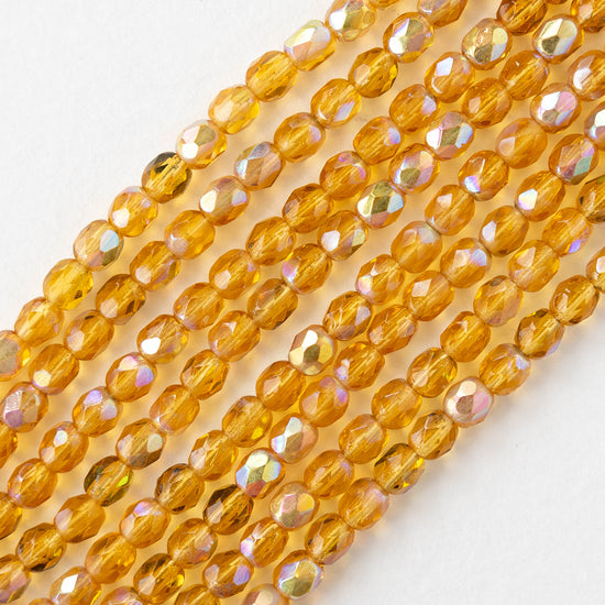 4mm Round Faceted Glass Beads - Transparent Amber AB - 50 Beads