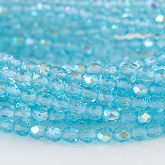 Load image into Gallery viewer, 4mm Round Beads - Aquamarine AB- 50 beads
