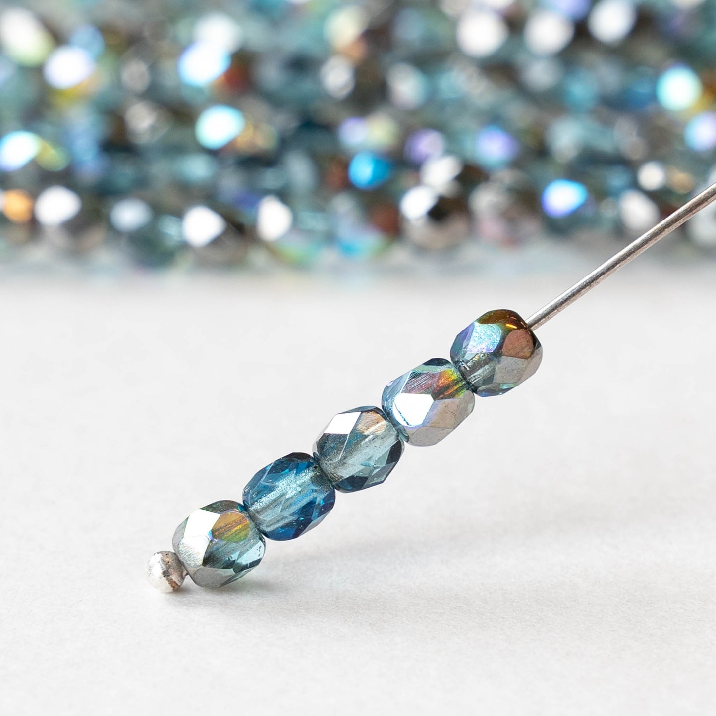 4mm Faceted Round Beads - Aqua Graphite AB - 6 inch strand - 40 beads