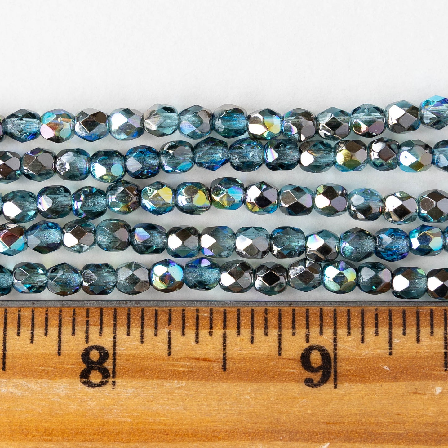 4mm Faceted Round Beads - Aqua Graphite AB - 6 inch strand - 40 beads
