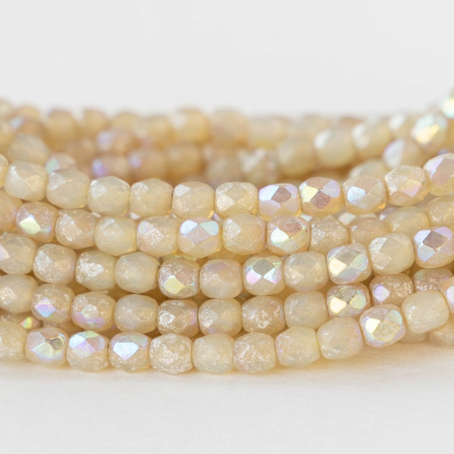 4mm Round Faceted Glass Beads - Opaline Ivory AB - 50 Beads